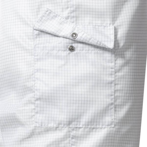 The image displays a section of a shirt made from light fabric featuring a checkered pattern. It includes a chest pocket that is secured with a flap and two snap buttons.