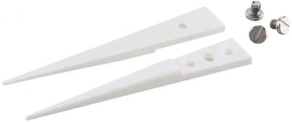 The image shows two white, pointed plastic parts shaped like wedges. Next to them are two silver screws. Each part has a hole in the center.