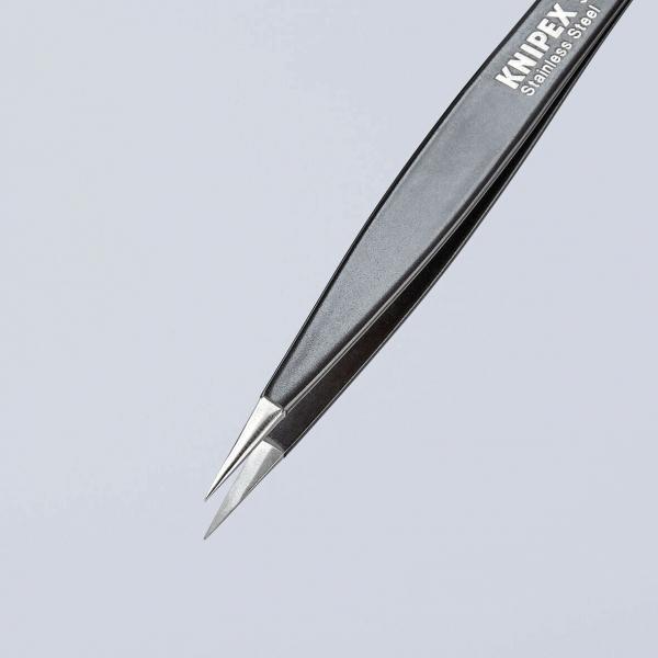 The image shows a black tweezer with pointed ends. On the side, there is the inscription "KNIPEX" made of shiny metal. The surface is smooth and glossy.
