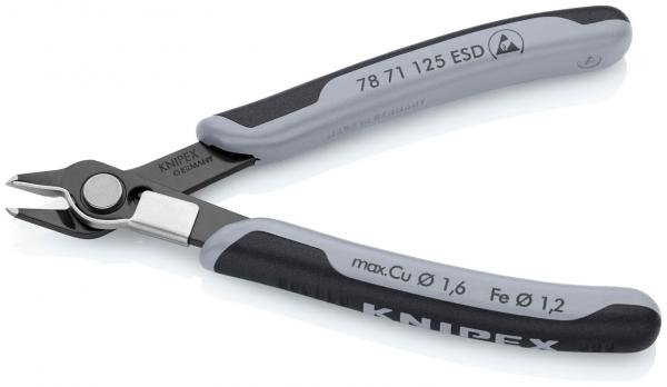 The image shows a small pair of pliers with precise cutting edges. The handles are black with gray rubber inserts for better grip. It is intended for fine work.