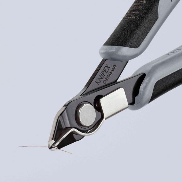 The image shows a diagonal pliers with a black and gray grip area. The cutting edge is sharp and shiny, ideal for precise cutting of wires or fine materials.