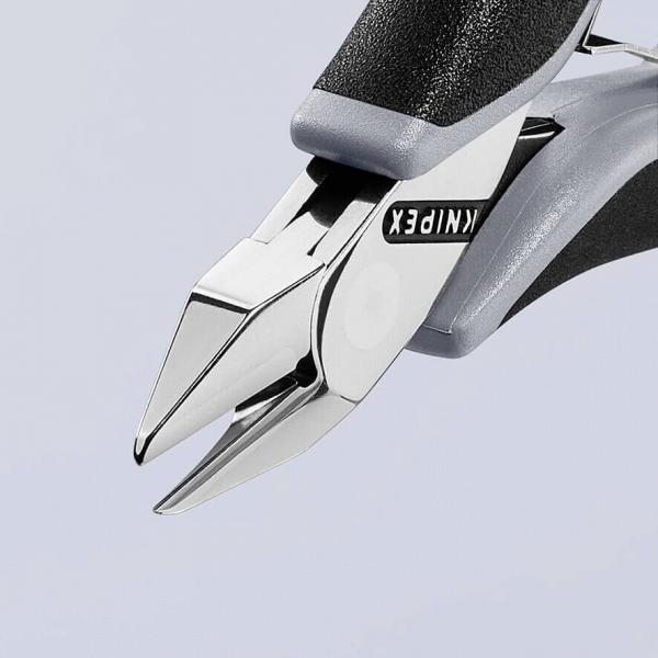 The image shows a precision pliers with pointed, sharp blades and an ergonomic handle, primarily used in electronics or jewelry manufacturing.