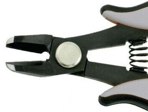 The image shows a pair of pliers with a black and white handle. The head section is open and has sharp, pointed edges. There is a spring in the middle for support.