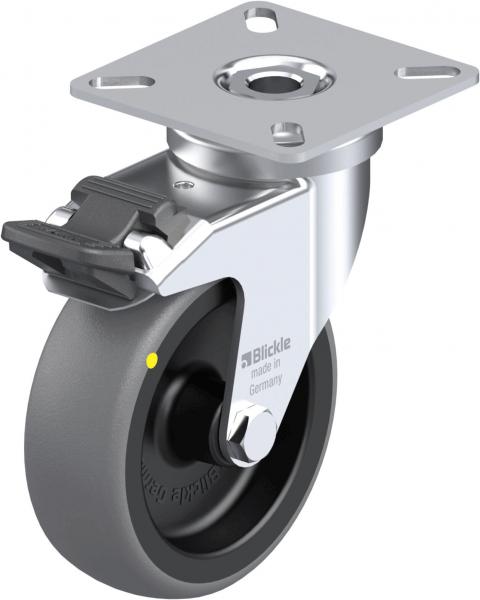 The image shows a caster wheel with a metallic holder and a gray rubber tread. It has a solid handle and a yellow dot on the side for identification.