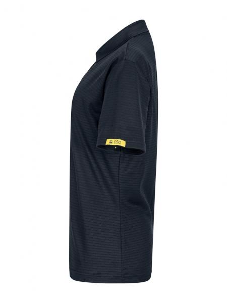 The image shows a black polo shirt in profile. It has a classic collar and short sleeves. There is a yellow label on one sleeve. The fabric appears slightly textured.