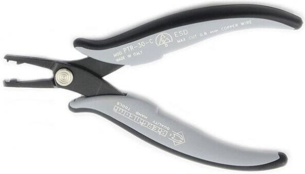 Das Bild zeigt eine graue Zange mit schwarzen, ergonomischen Griffen. Sie hat eine spezielle Öffnung an der Spitze, die für präzise Arbeiten gedacht ist. Die Zange wirkt stabil und handlich.