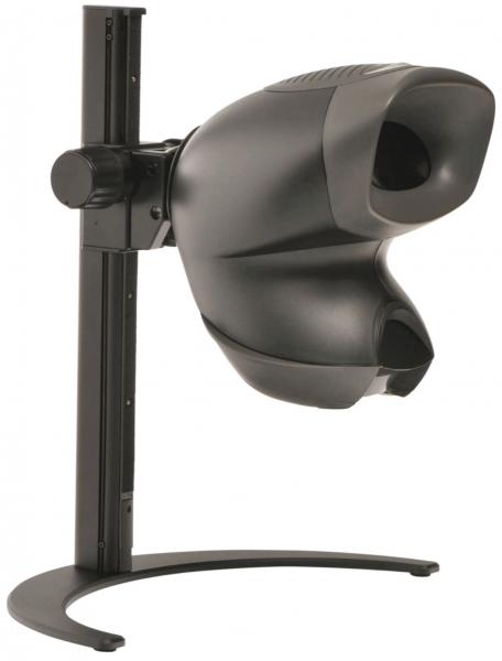 The image shows a black, technical device with two round openings on the front, mounted on a sturdy base. It has a smooth, ergonomic shape.