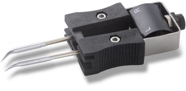 The image shows an interface with two metal probes that look like clamps, and a housing with a rotatable part. The letters "L" and "R" are printed on the rotatable part.
