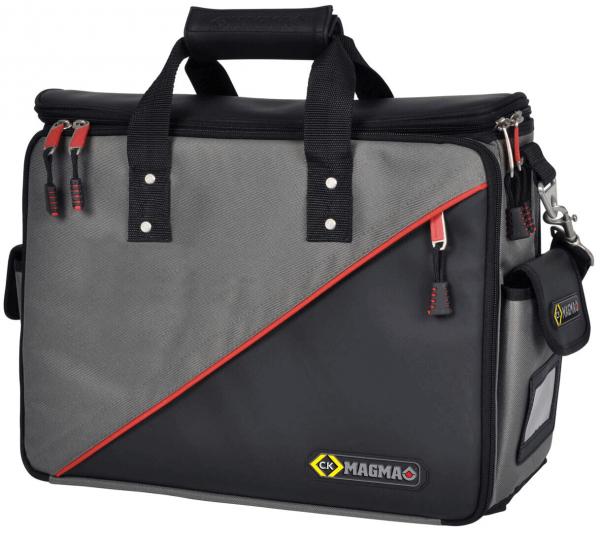 The bag is rectangular with a gray and black design. It features a wide carrying handle, several zippers, and a red diagonal stripe. A side pocket is also present.