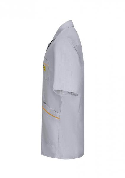 The image shows a gray short-sleeved shirt. It features a classic cut, a collar, and a chest pocket. An orange seam runs along the pockets. The material appears light and functional.
