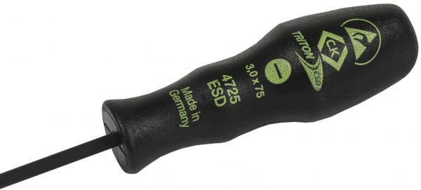 Das Bild zeigt einen Schraubendreher mit einem schwarzen, rutschfesten Griff. Auf dem Griff sind grüne Schriftzüge und Symbole zu sehen. Die Klinge ist dünn und gerade.
