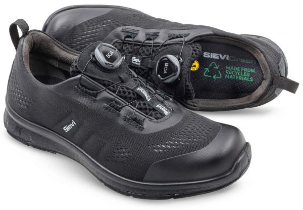 Das Bild zeigt ein Paar schwarze, sportliche Schuhe. Sie haben ein modernes Design mit einer speziellen Schnürung, die an zwei festen Rädchen befestigt ist. Die Materialien sind umweltfreundlich.