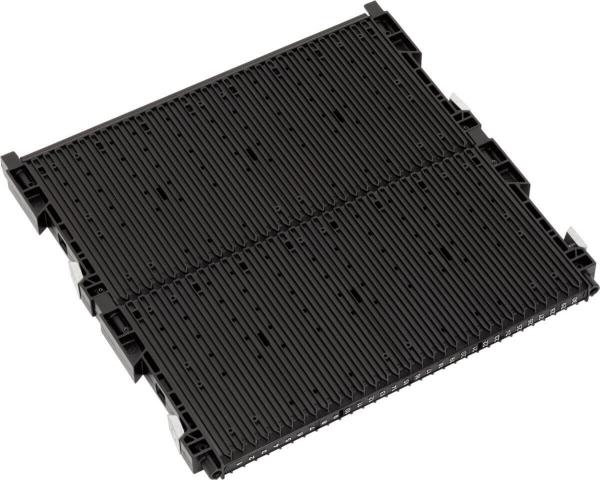 Das Bild zeigt eine schwarze Palette mit einer strukturierten Oberfläche und mehreren runden Erhebungen. Sie hat an den Seiten kleine Vertiefungen zum Greifen.