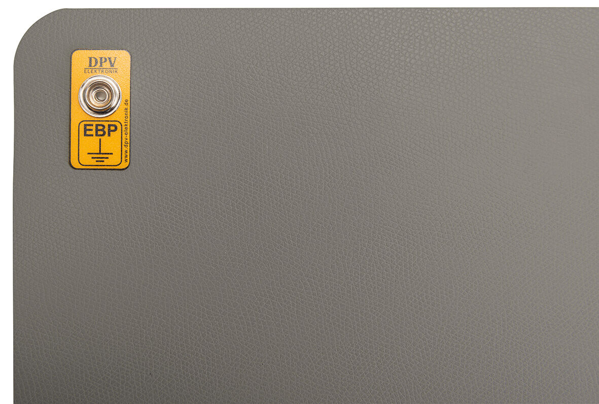 The image shows a gray surface with a rounded corner. In the top left, there is a yellow label with the text "DPV EBP" and a mounting point.