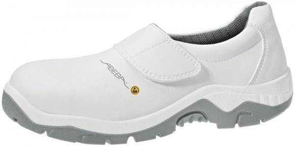 Der Schuh ist weiß, aus glattem Material, mit einem elastischen Einsätze und einer grauen Sohle. Er hat eine robuste, rutschfeste Außensohle für guten Halt. Ideal für den Berufsalltag.