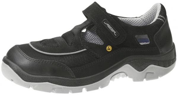 The shoe is black with gray accents. It features a Velcro fastener and a non-slip sole, ideal for comfort and stability. The upper is made of lightweight, durable fabric.