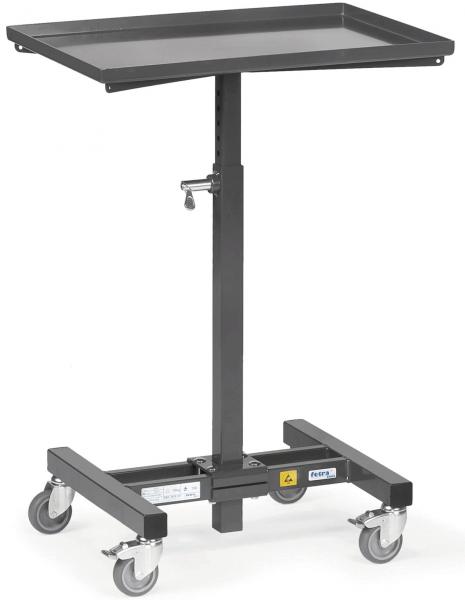 The image shows an adjustable-height serving table with a rectangular, flat surface. It stands on a sturdy frame with four casters, which allow for mobility.