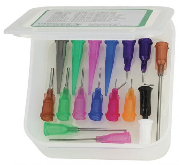 The image shows a transparent container with various medical needles, organized and sorted by color. There are several colors such as pink, green, purple, and orange, as well as one gray, black, and white needle each.