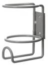 Preview: The image shows a gray metal holder. It has a round cutout on top to hold a beverage or similar, and is flat with a wall mount.
