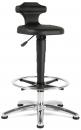 Preview: The stool has a round, padded seat in black and a backrest. The height-adjustable column is mounted on a sturdy, chrome-plated base with five casters.