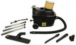 Preview: The image shows a black vacuum cleaner with a round filter on top. Next to the device, there are various connecting pipes and attachments, including a wide nozzle and a brush.