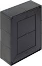 Preview: The image shows a black, rectangular box with rounded corners and a smooth surface. On the front, there is a square flap in the middle.