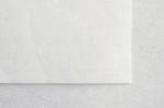 Preview: The image shows a simple, white sheet of paper lying on a light background. The texture of the paper is slightly textured.