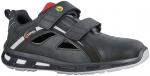 Preview: The shoe is black with gray and red accents. It has two wide Velcro straps and a breezy design with side holes. The sole is sturdy and lightly textured.