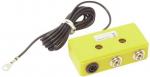 Preview: The image shows a yellow, rectangular casing with two sockets and a long, black cable. At one end of the cable, there is a metal eyelet for attachment.