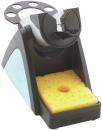 Preview: The image shows a soldering station sponge holder. It consists of a lower bracket with a yellow sponge and an upper area that accommodates a soldering tip cleaner.