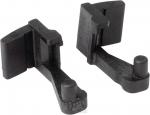 Preview: The image shows two black plastic parts that are symmetrically shaped. Each part has a flat top surface and a short, straight pin. They could be part of a mechanism or a mount.
