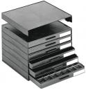 Preview: The image shows a black drawer unit with several compartments. There is a flat top surface, with five drawers underneath, some of which are partially pulled out.