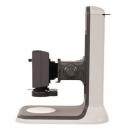 Preview: The image displays a medical device in a vertical position. It has a gray and black surface with a round base. On the side, there is a small monitor attached, used for measuring.