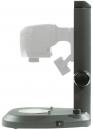 Preview: The image shows a medical device for eye examination, consisting of a sturdy base, a vertical arm, and a head that can be adjusted for examination.