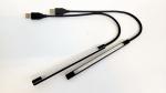 Preview: Das Bild zeigt ein USB-Licht, bestehend aus zwei schmalen, transparenten Röhren mit schwarzen Enden. Ein USB-Anschluss führt zu einem Kabel, das die Röhren verbindet.