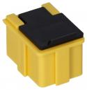 Preview: The image shows a small, square electrical plug. It has a yellow body and a black cap. There are notches on the sides for a secure grip.