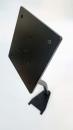 Preview: The image shows a black, rectangular bracket on a narrow base. The bracket has several holes for mounting. It is slightly tilted and appears stable.