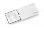 Preview: The image displays a handy magnifier with a rectangular, white casing. The lens is slightly convex and includes an integrated light. It is used to enhance the visibility of small texts or details.