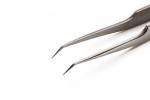 Preview: The image shows a silver tweezer with sharp, fine tips. It is slender and has a smooth surface, ideal for gripping small objects. The background is white.