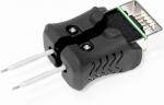 Preview: The image shows a device that looks like a black handle with two metal pins. It has a plug at the top end and is intended for testing or programming electronic components.