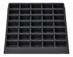 Preview: Das Bild zeigt eine rechteckige, schwarze Backform mit 36 gleichmäßig verteilten, kleinen Vertiefungen, die für Muffins oder Cupcakes geeignet ist. Die Oberfläche ist glatt.