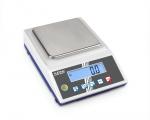 Preview: This is a digital kitchen scale with a flat, metallic weighing surface and a digital display that shows the weight in numbers. There are several buttons for functions.