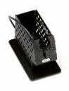 Preview: The image shows a black, lattice-like container with an open top, standing on a flat, rectangular base. It has a cable connection.