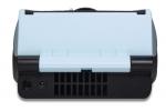 Preview: The image displays a compact device in black and blue. The top is light blue with two grooves. On the bottom, ventilation slots and a connector socket are visible.