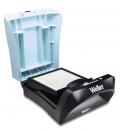 Preview: The image shows a black device with an open, light blue lid. Inside, there is an empty space apparently intended for books or documents.