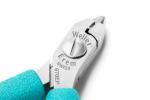 Preview: The image shows a small, silver pair of pliers with a round handle made of turquoise rubber. The pliers have a sharp tip and are suitable for precise tasks.