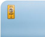 Preview: The image shows a blue-gray surface with a rounded corner. Attached to the surface is a small, yellow sign with a metal socket and the inscriptions 
