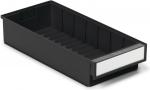 Preview: The image shows an elongated, rectangular drawer in black, with a perforated bottom. A white, writable front panel is attached on one side.