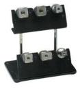 Preview: The image shows a black, sturdy stand with four silver coils arranged in two rows. Each coil has a small opening in the center.