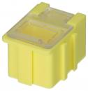 Preview: The image shows a compact, yellow box. It has a square shape with rounded corners and a transparent top. There are vertical grooves on the sides.